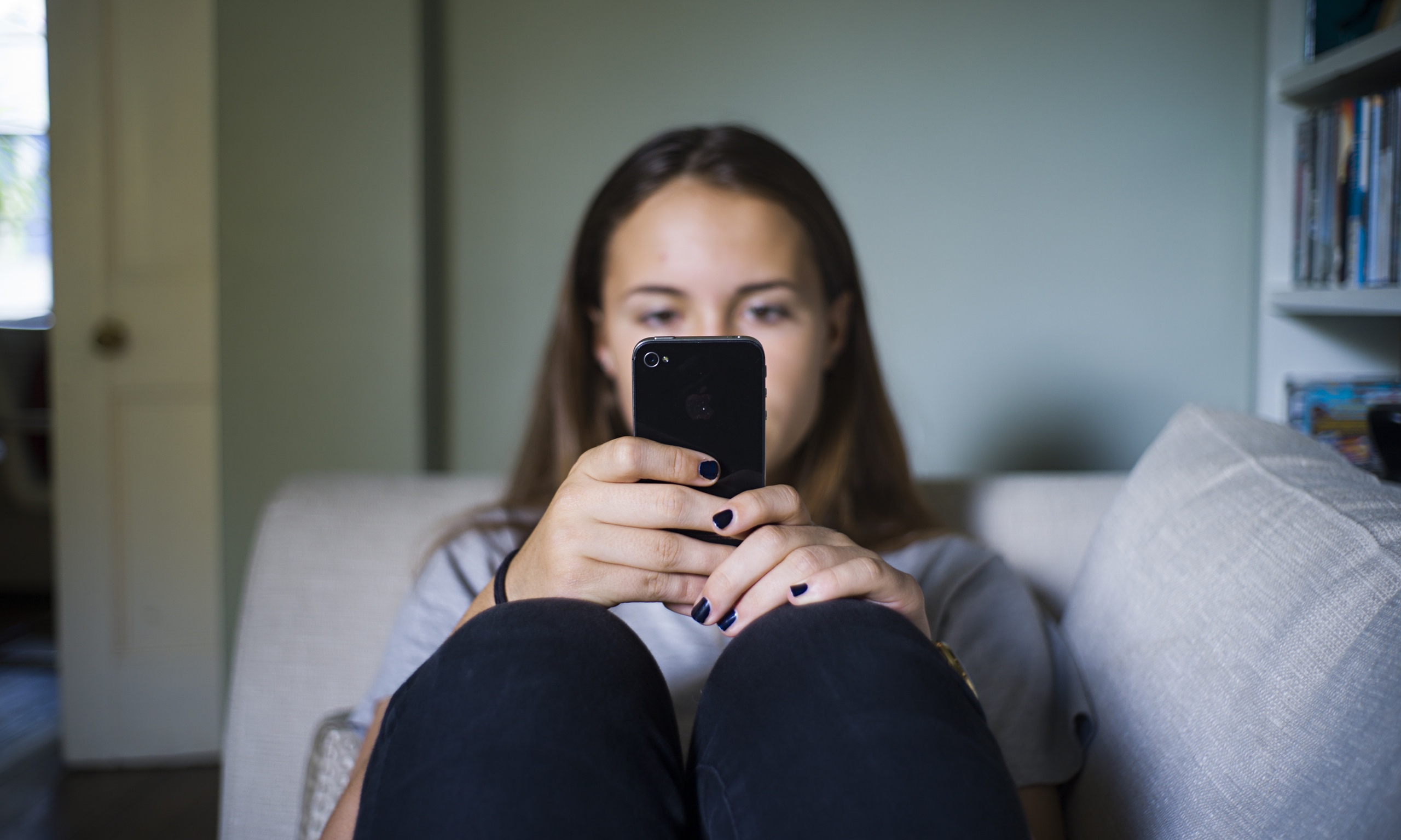 texting on couch