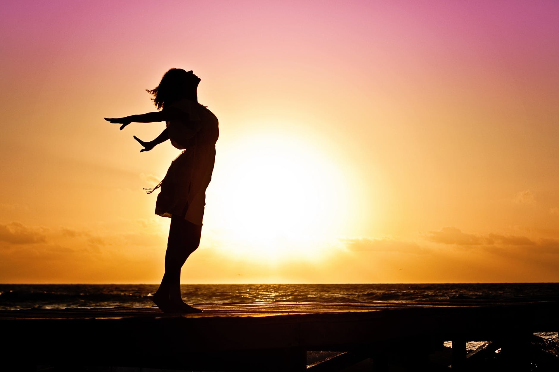 woman watching sunrise